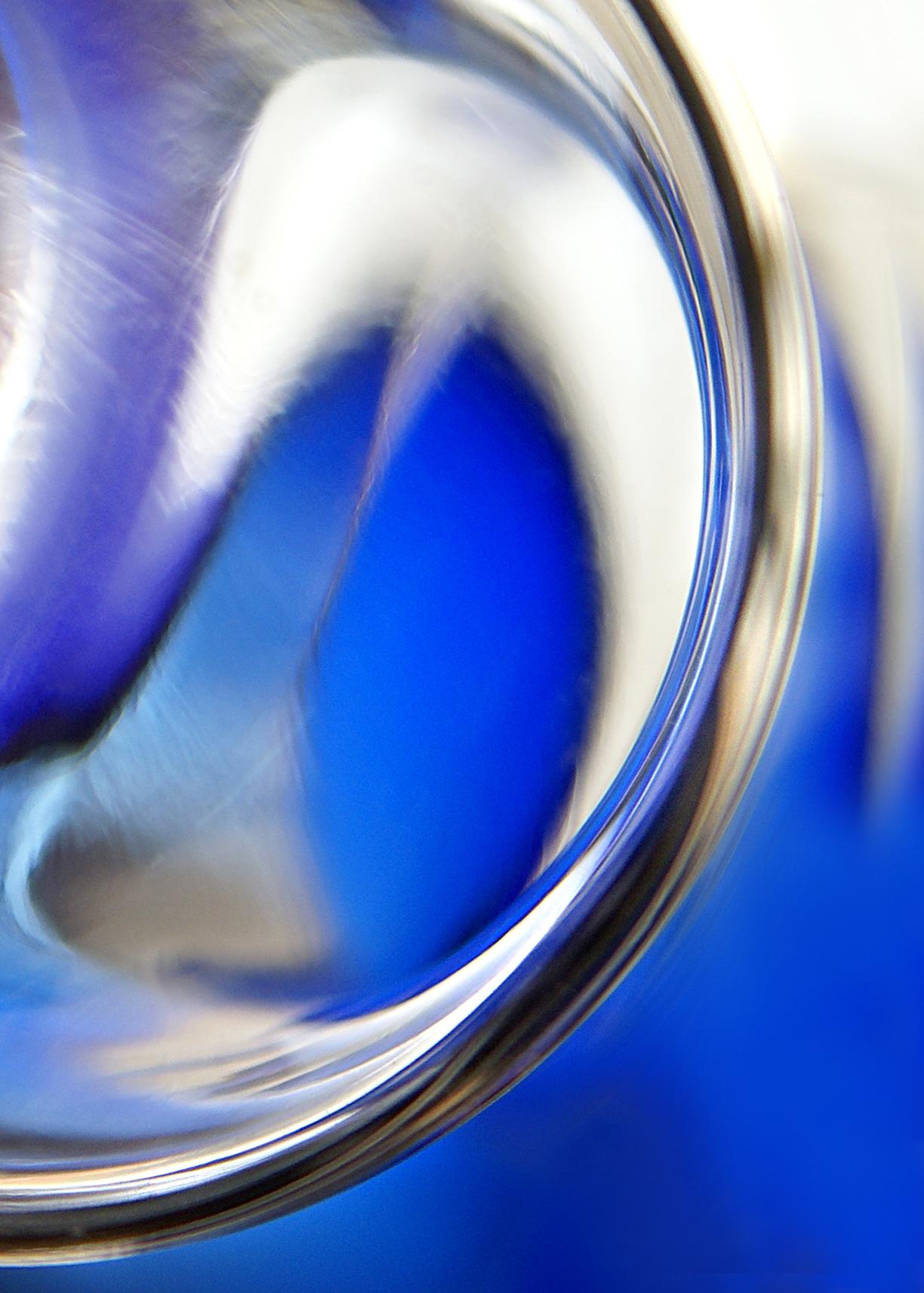 Fresnel 1-1, a picture showing a reflection of a light in a glass like surface with blue shades